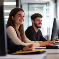 Viola sat with a man at a computer
